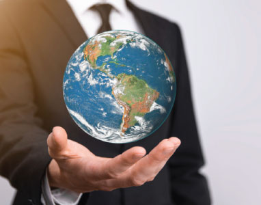 Hand holding Earth globe